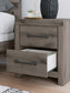 Graystorm Queen Panel Bed with Mirrored Dresser, Chest and Nightstand